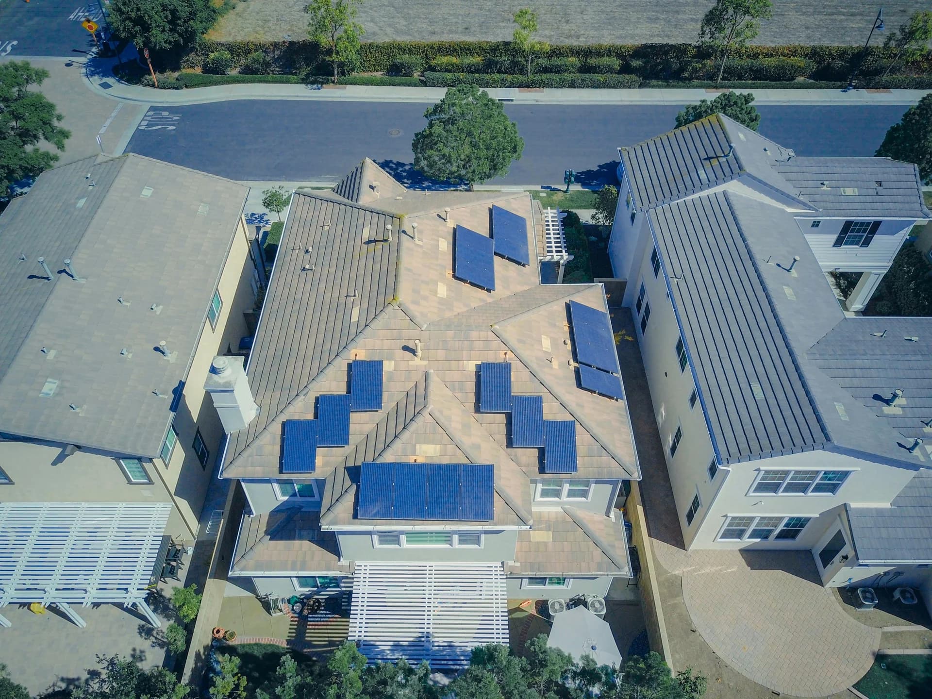 Professional technician cleaning solar panels on Phoenix rooftop